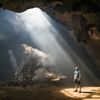 
	                    Bangkang - a cave full of bats. Great place, but something more dense than water drops from the ceiling :)